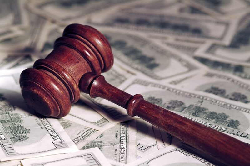 Understanding Counterfeiting Charges & Penalties In Virginia